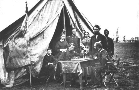 Chess, a favorite pastime in camp, finds Colonel Martin McMahon, General
Sedgwick's adjutant, engaged in the contest that was a favorite of Napoleon and
many other military leaders.