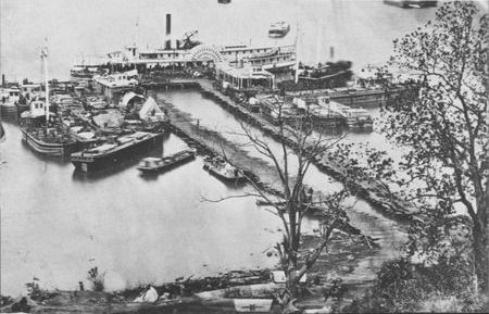 Federal ships crowd the magazine wharf at City Point with equipment and supplies
for army wagons from Petersburg. Twenty per cent of the total supply tonnage
was transported by water.