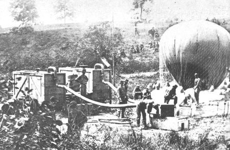 Balloon observation on the battlefield was made possible by the portable gas generator.
Here Professor T.S.C. Lowe's balloon is inflated by mobile generators in
front of Richmond in 1862.