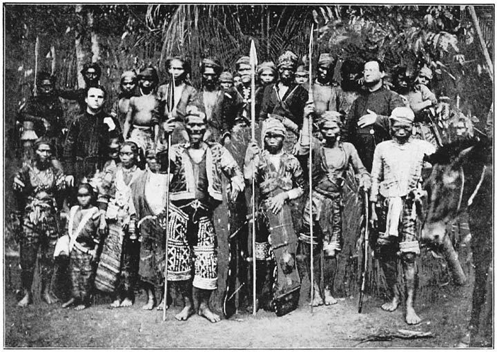 The Datto Manib, Principal Bagani of the Bagobos, with some Wives and Followers and two Missionaries.