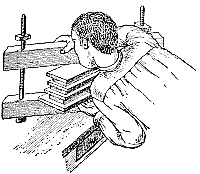Fig. 4—Lifting into the Press.