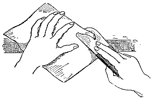 Fig. 63—Paring with French knife.