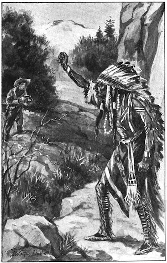 The weird old Zuni Witch Doctor whirled around, looked at Billie, raised his hand and made a threatening gesture.