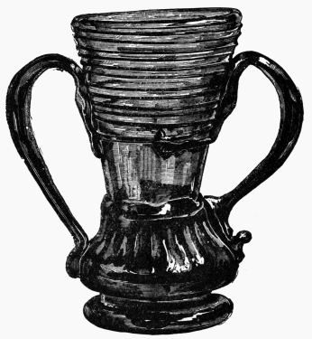 VASE OF GREEN GLASS, WITH BLACK HANDLES AND RIBS.—SPANISH, 17TH CENTURY.
