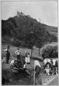 Copyright by Underwood & Underwood, N. Y.
CASTLE HOHENZOLLERN
Ancestral seat of the Hohenzollern dynasty. The men and women in the foreground
are good types of Germany's peasantry.