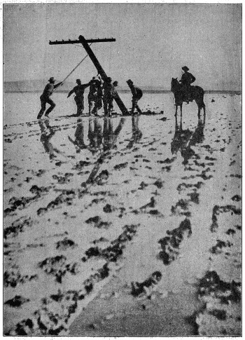 Erecting pole in shallow water