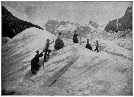 Ladies climbing a glacier in long skirts