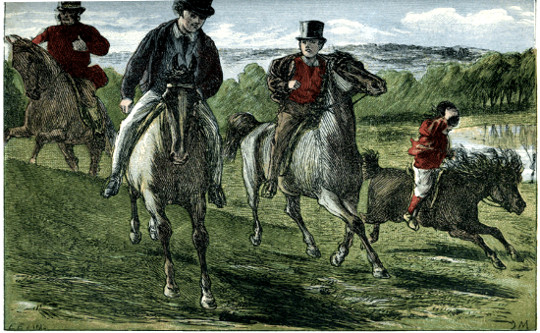 Boys riding ponies