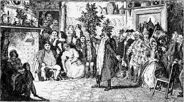 man with long beard and a bush on his head holding a tree in front of a fireplace surrounded by people