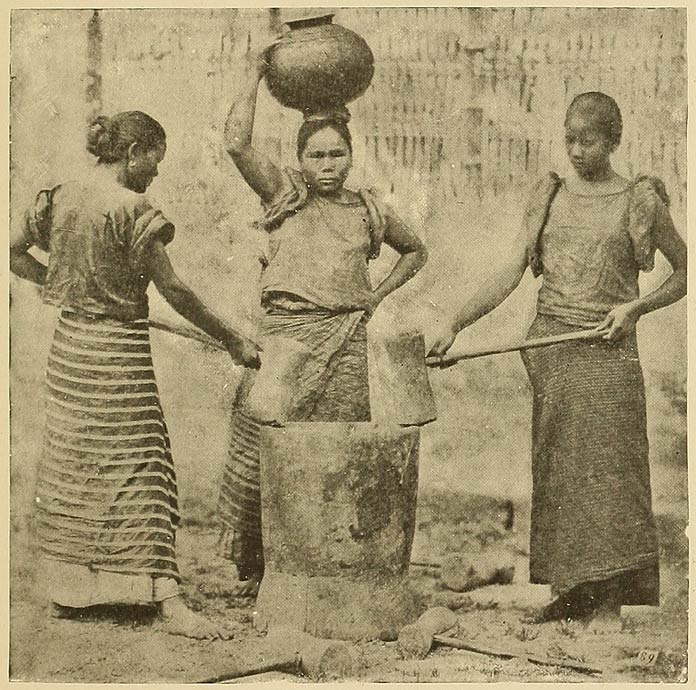 Native Women Hulling Rice.