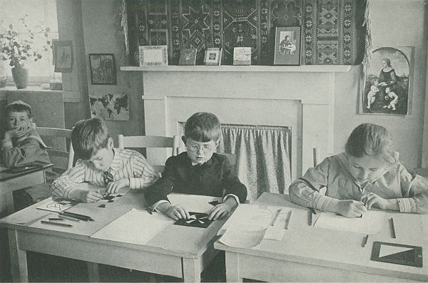 children working at desks