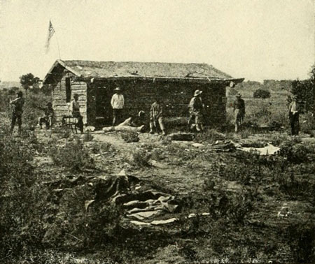 Men of the 1871
Expedition of an Abandoned Cabin Opposite the Mouth of the Uinta River.