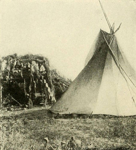 Uinte Ute Tipi and a
Summer Shelter and Outlook, Showing the Old-time Notched Log for a Ladder.