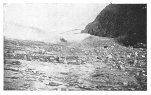 Fig. 29. The edge of a part of the great Greenland ice sheet (on the left) resting on the land, over which are strewn many boulders brought by the ice and left there when it melted.
