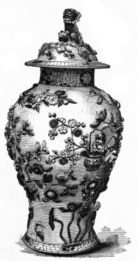 Fig. 66.—Vase, surmounted by Ky-lin. Flowers in Relief.
(A. Belmont Coll.)