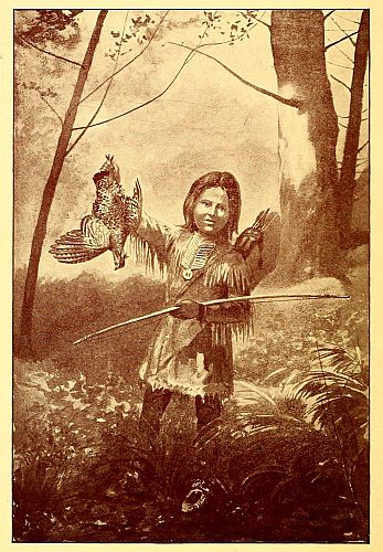 boy holding bow and bird