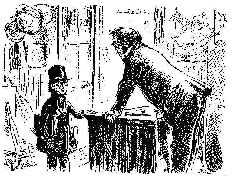 boy speaking to shopkeeper