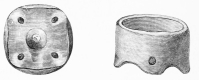 No. 144. Small Terra-cotta Vessel from the lowest
Stratum, with four perforated feet, and one foot in the middle (14
M.).