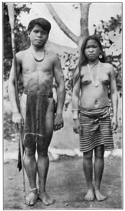 3. Tugínai Páit, of Amgodé clan, and his wife. (Photograph by Beyer.)