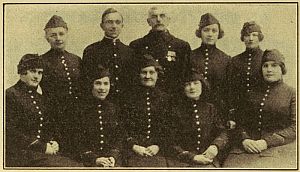 photograph of mostly women in uniform