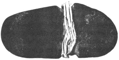 Full-grooved ax with fragment of hafting material. Length, 7&Prime;; Maximum width, 3&frac12;&Prime;; Width at groove, 2&frac34;&Prime;.