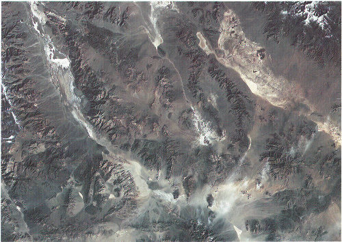 The Garlock fault, near the bottom of this Landsat image, is generally considered to be the geologic border between the Mojave Desert in the south and the Great Basin Desert in the north. The Great Basin contains more than 150 discrete desert basins separated by more than 160 mountain ranges.