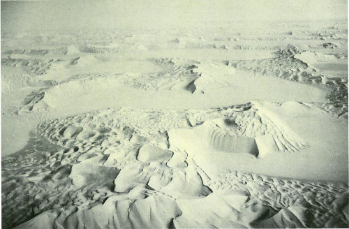 Small crescentic dunes occur on the crests of these complex dome dunes of Saudi Arabia’s Empty Quarter (photograph by Elwood Friesen).
