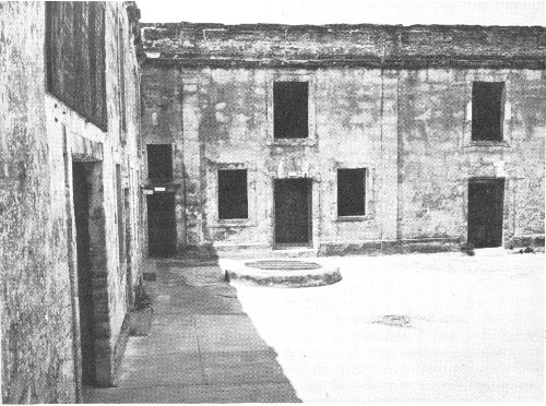 MOST OF THE ROOMS OPEN INTO THE SQUARE COURTYARD OR PARADE OF THE FORT. THE WELL IN THIS CORNER FURNISHED THE ONLY PALATABLE WATER SUPPLY FOR REFUGEES INSIDE THE FORT DURING TIMES OF SIEGE.