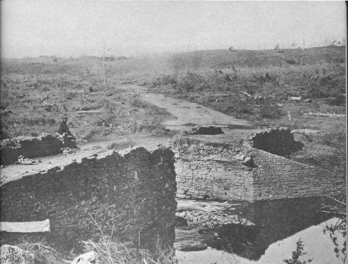 The ruins of the Stone Bridge over Bull Run, from the east. Here opened the First Battle of Manassas. Wartime photograph. Courtesy National Archives.