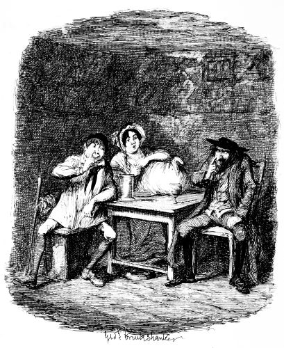 Two men and a woman around a table in a dark room