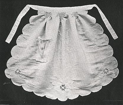 half-apron with beautiful eyelet insets and scalloped edges