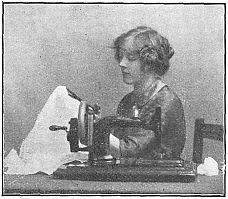 woman sewing with machine