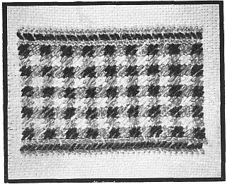 Photograph of embroidery; looks like checkerboard