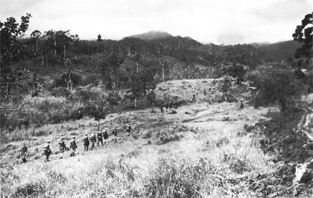 FOOTHILLS OF CENTRAL MOUNTAIN RANGE are patrolled by elements of the 1st Cavalry Division.