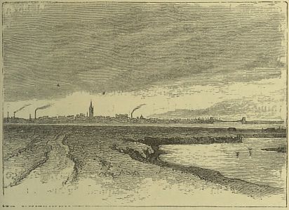 barren landscape, water and city in distance