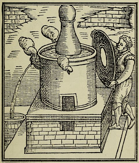 man carring lid with hole in it that fits over top of still on furnace