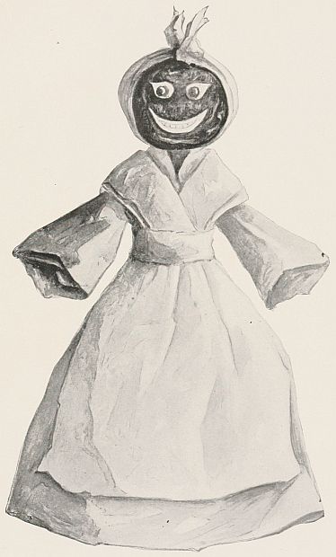 Lady in kerchief and apron with prune face