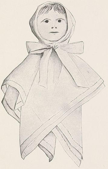 Doll with clothes made from kerchief and flat face