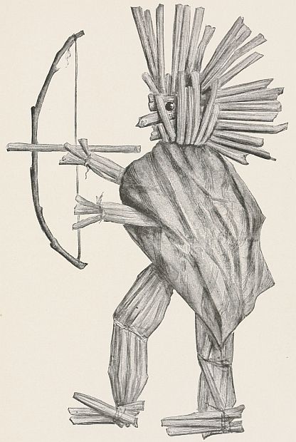 straw Indian with boy and arrow