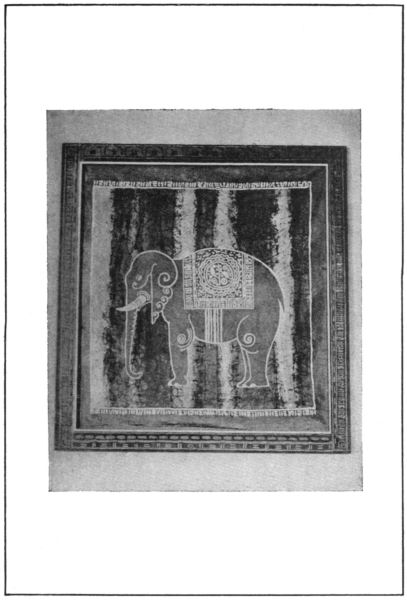 A central elephant design with decorative border