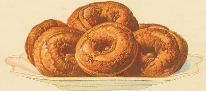 plate of nice brown doughnuts