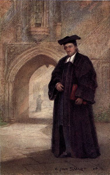 Campion in robes at college, stone arch behind him