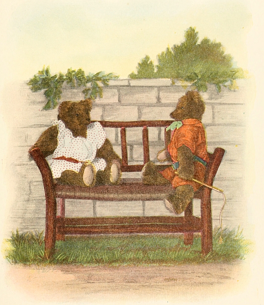 two teddies on bench in garden