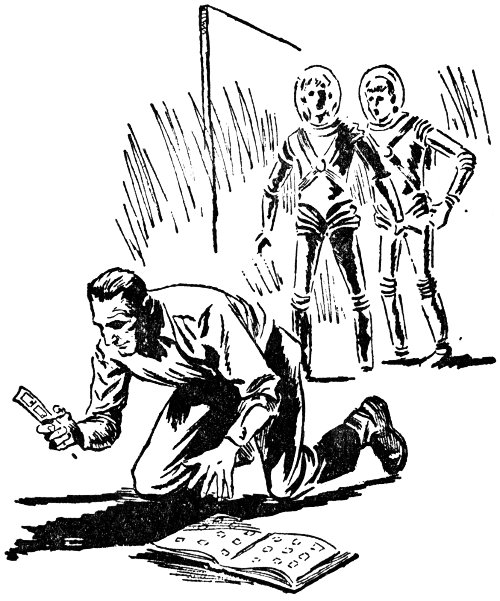 Benasco was seated on the floor like a child with a new scrapbook