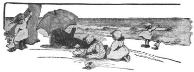 Girls and dolls sitting on the beach