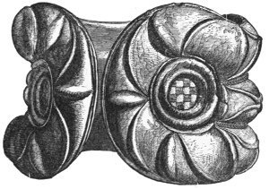Fig. 115.—Bronze Armlet, with enamelled ornaments (one of a pair), found at Castle Newe, Aberdeenshire. Front view (5¾ inches in diameter).