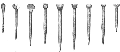 Fig. 225.—Bone Pins, with ornamental heads, from Broch of Burrian (actual size).