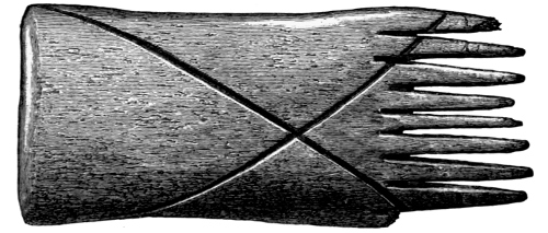 Fig. 239.—Long-handled Comb from the Broch of Burrian (4 inches in length).