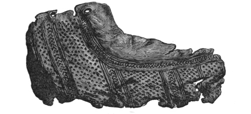 Fig. 245.—Portion of a Shoe of stamped leather (length, 7 inches).