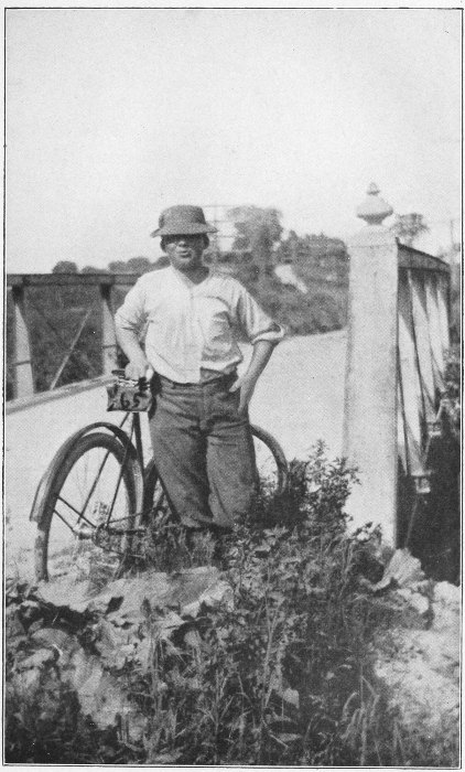 JOHNNY KISHMAN, A GERMAN BOY, GOT OFF HIS BICYCLE